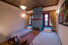 Twin room with fireplace